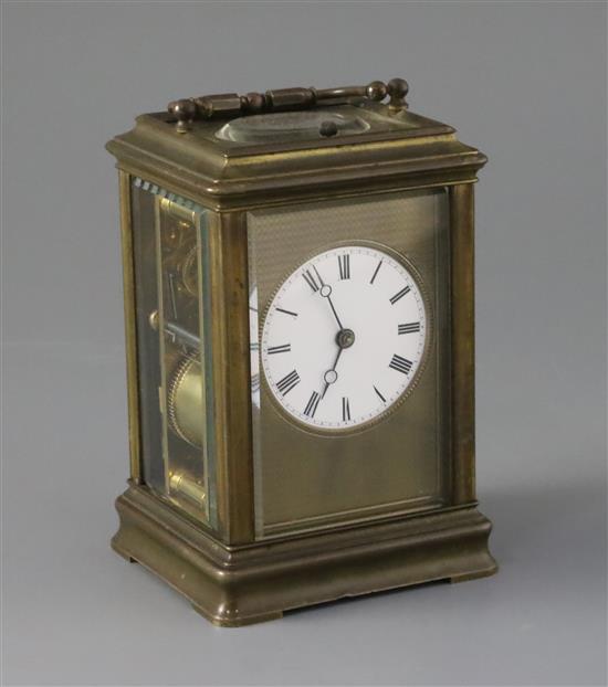 A late 19th century French lacquered brass hour repeating carriage clock, width 3.5in. depth 3.25in. height 5.5in.